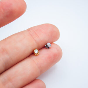 piercing crowned dot